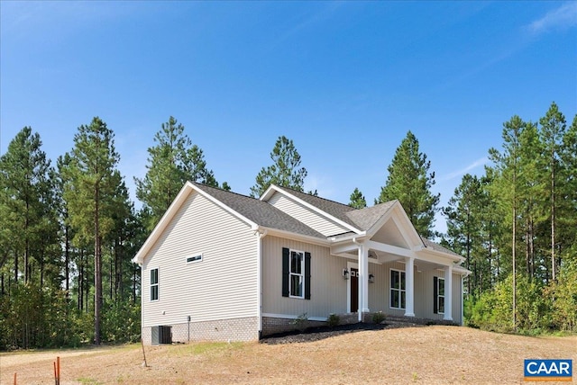 view of front of home with cooling unit