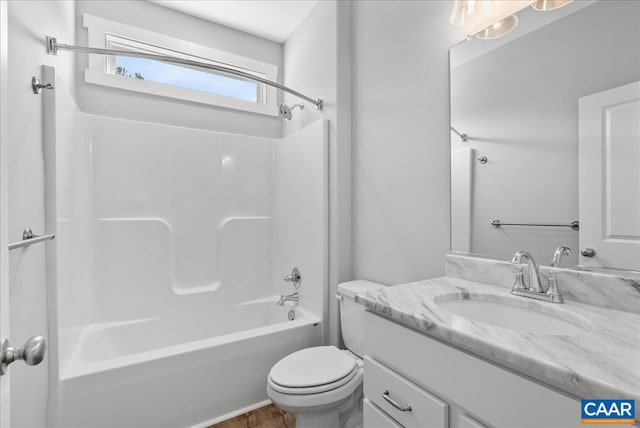 full bathroom featuring vanity, toilet, and shower / bathtub combination