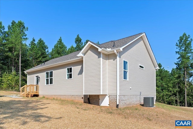 view of home's exterior featuring central AC unit