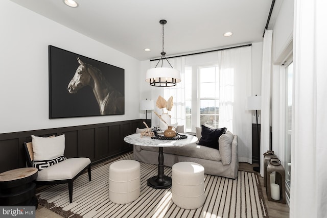 living area with hardwood / wood-style flooring