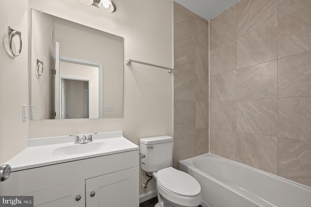 full bath featuring toilet, shower / bathtub combination, and vanity