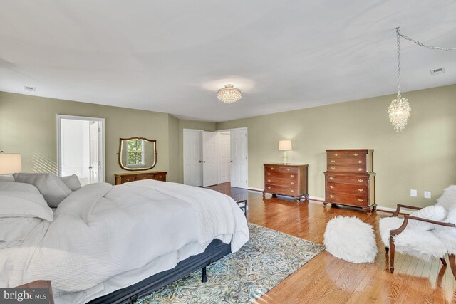 bedroom featuring hardwood / wood-style flooring