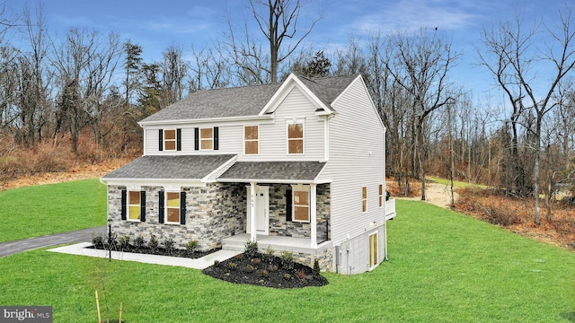 view of property featuring a front yard