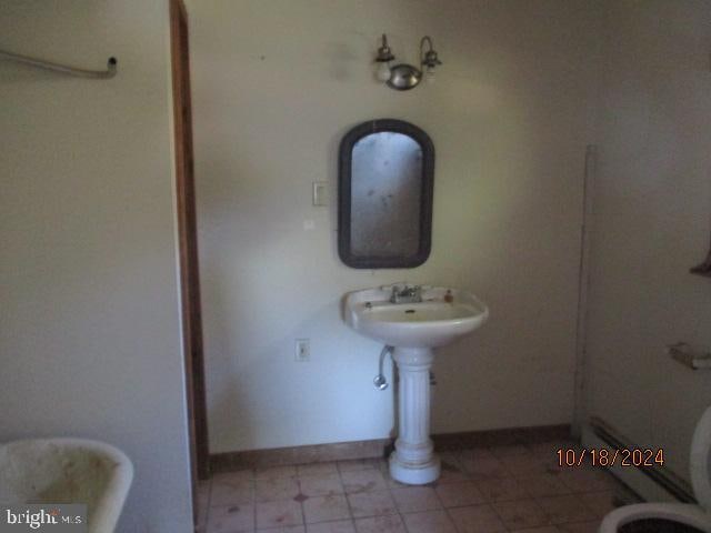 bathroom featuring toilet