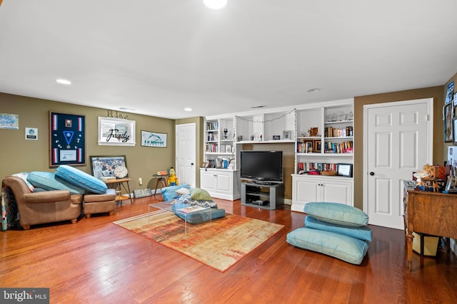 living room with hardwood / wood-style floors