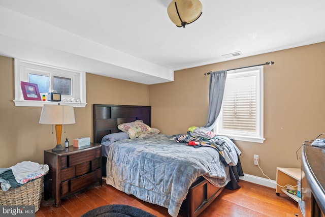 bedroom featuring hardwood / wood-style floors