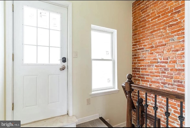 doorway with brick wall