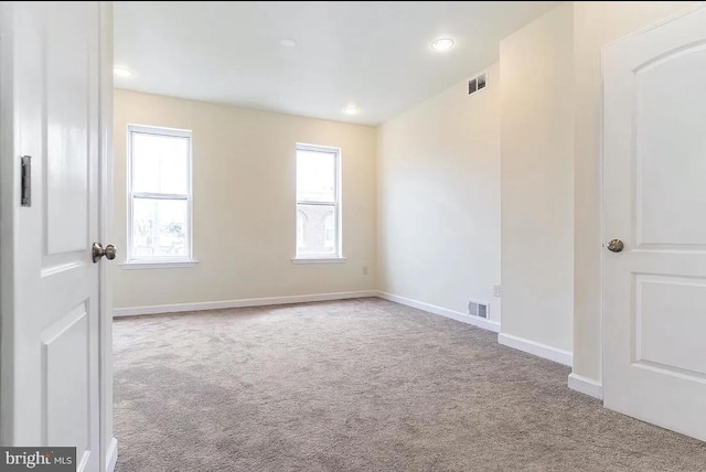 view of carpeted spare room