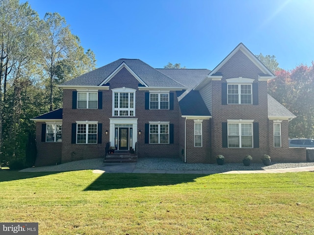 view of front of house with a front lawn