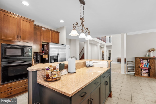 kitchen with a kitchen island, ornamental molding, black appliances, light stone countertops, and light tile patterned floors