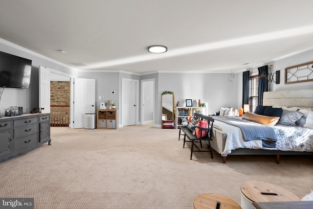 carpeted bedroom featuring crown molding