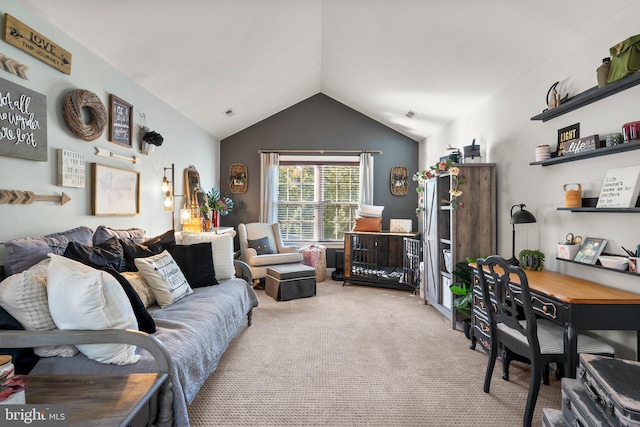 living room featuring lofted ceiling and light carpet