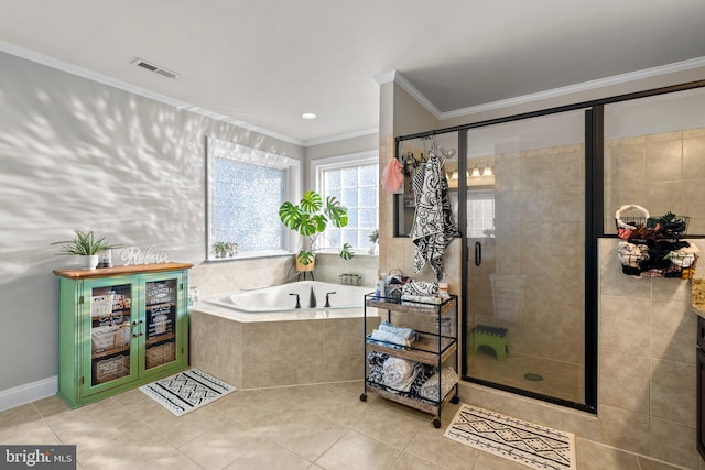 bathroom featuring crown molding, shower with separate bathtub, and tile patterned flooring