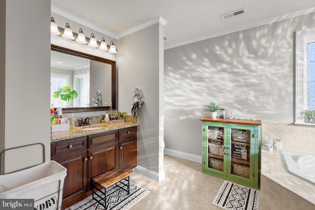 bathroom with vanity, crown molding, a relaxing tiled tub, and tile patterned floors