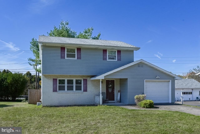 front facade with a front lawn and a garage