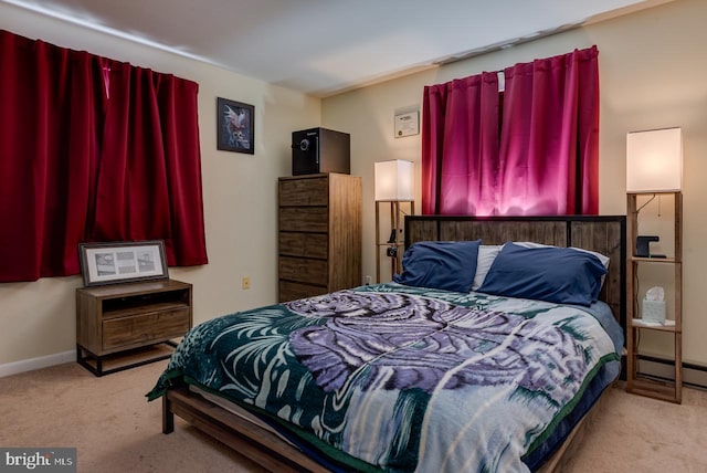 bedroom with light colored carpet