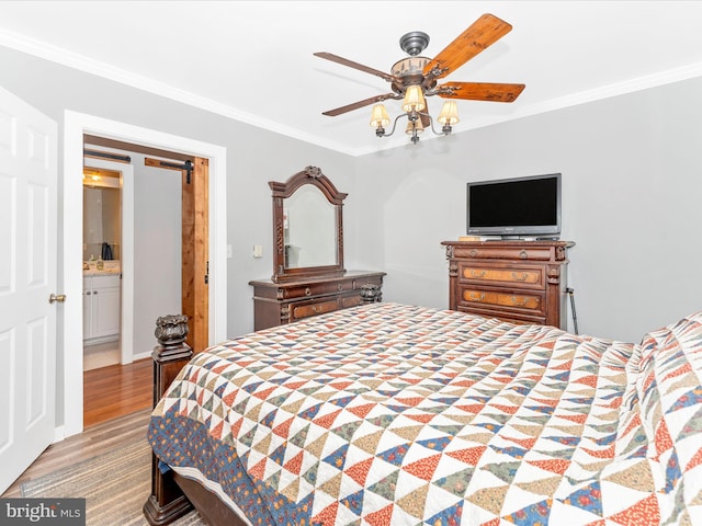 bedroom with ensuite bathroom, ceiling fan, light hardwood / wood-style flooring, and ornamental molding