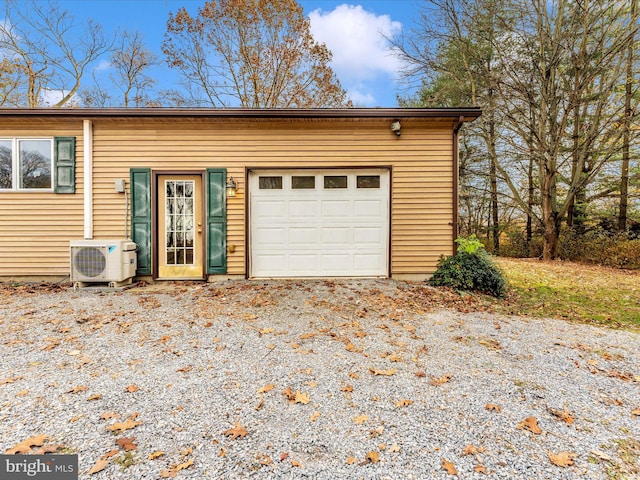 garage featuring ac unit