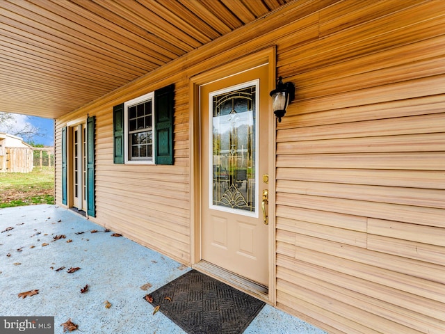 doorway to property featuring a porch