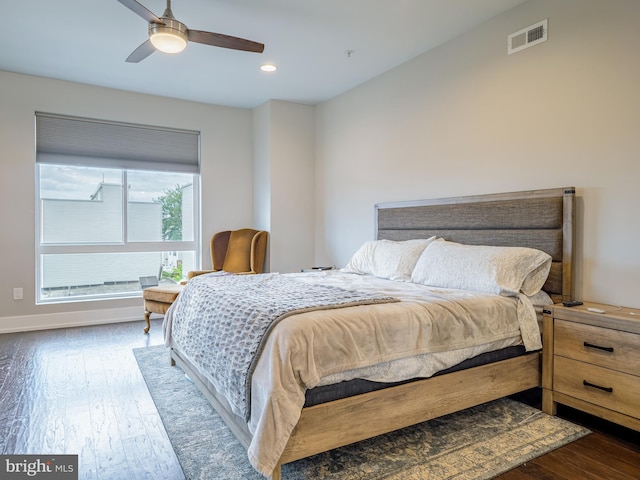 bedroom featuring dark wood-type flooring and ceiling fan