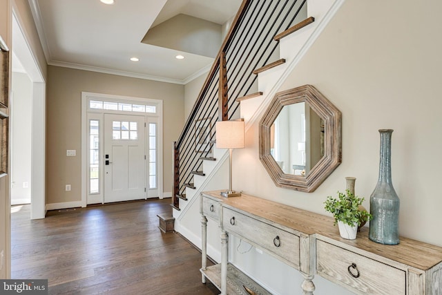 entrance foyer featuring dark wood finished floors, baseboards, recessed lighting, stairway, and crown molding