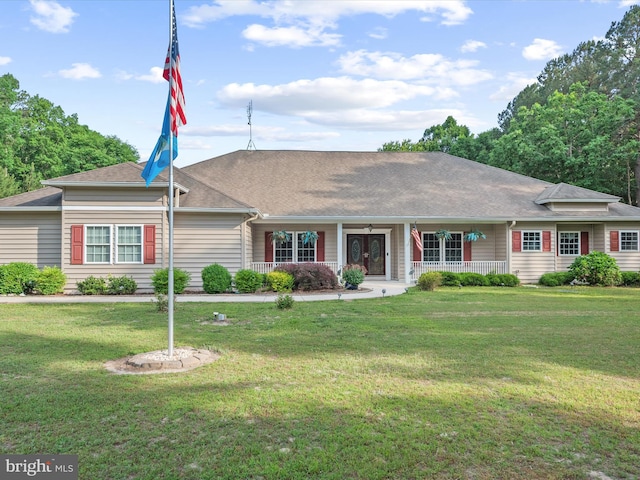 ranch-style house featuring a front yard and a porch