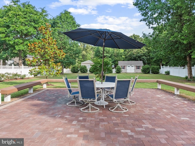 view of patio featuring an outdoor structure