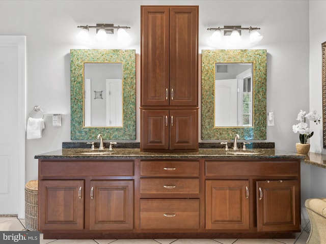 bathroom featuring vanity, track lighting, and tile patterned floors