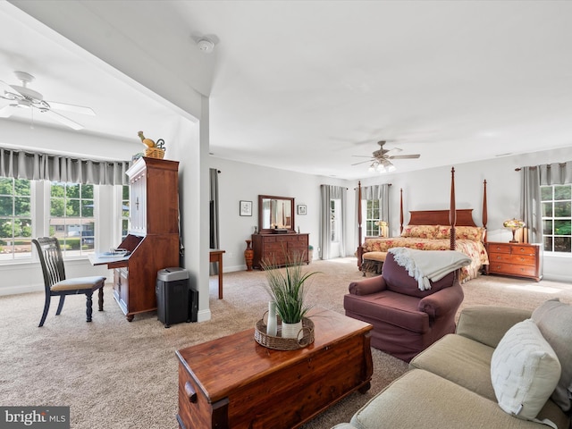 carpeted bedroom with ceiling fan