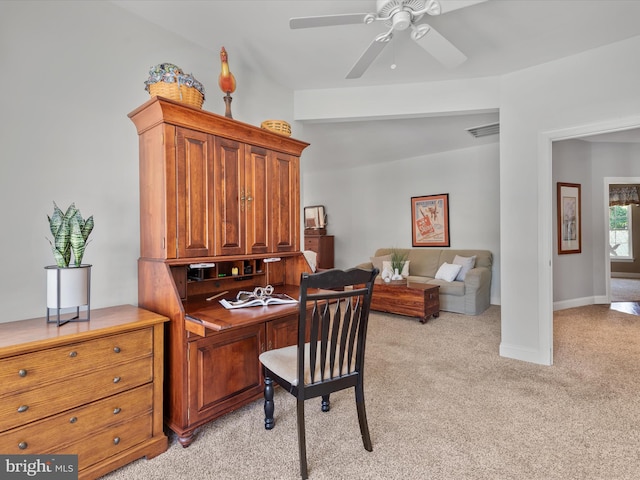 office area with light carpet, vaulted ceiling, and ceiling fan