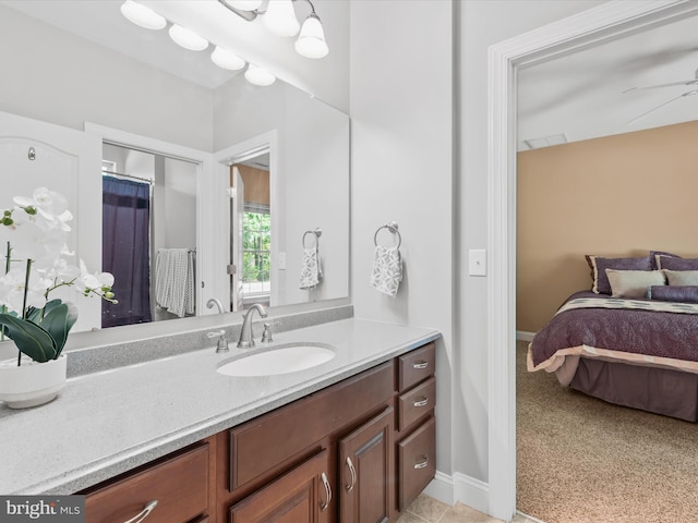 bathroom featuring vanity and ceiling fan