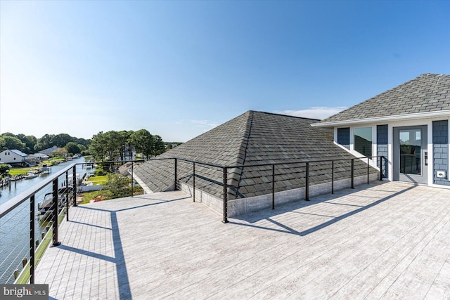 view of patio with a water view