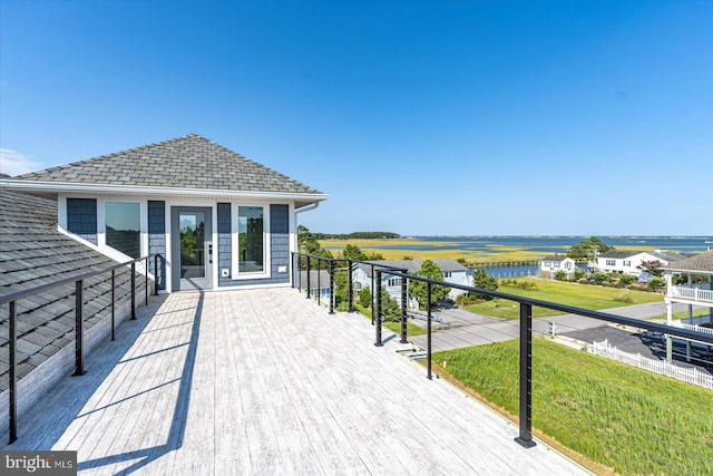 wooden deck with a yard