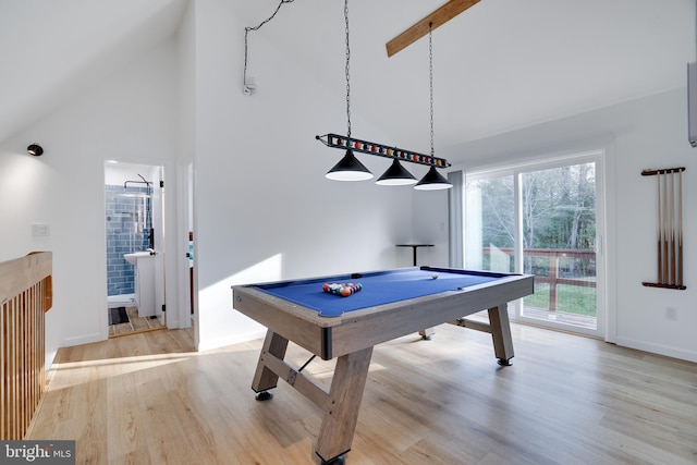 recreation room with billiards, light hardwood / wood-style flooring, and high vaulted ceiling