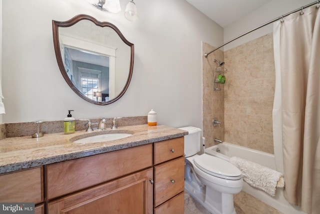 full bathroom featuring toilet, shower / bathtub combination with curtain, and vanity