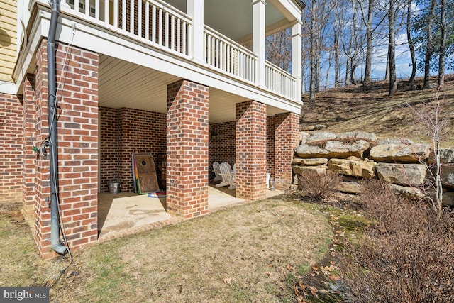 view of patio with a balcony