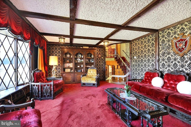 333 W Arch St, Frackville, PA 17931 - carpeted living room with coffered ceiling, wallpapered walls, beamed ceiling, stairway, and crown molding
