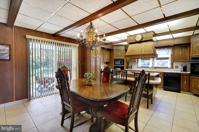 333 W Arch St, Frackville, PA 17931 - dining area with a chandelier, wood walls, light tile patterned floors, and beam ceiling