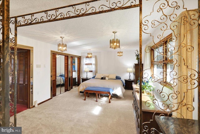 333 W Arch St, Frackville, PA 17931 - bedroom featuring a chandelier, carpet floors, a textured ceiling, and a closet