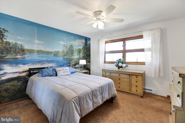 carpeted bedroom with a baseboard radiator and ceiling fan