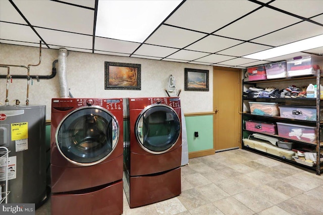 333 W Arch St, Frackville, PA 17931 - clothes washing area featuring baseboards, laundry area, electric water heater, and washing machine and dryer