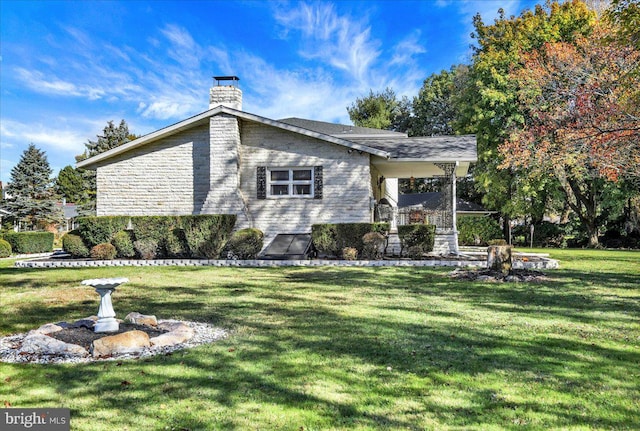 view of home's exterior featuring a lawn