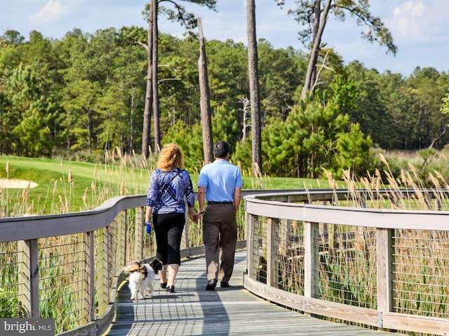 view of property's community with a wooden deck