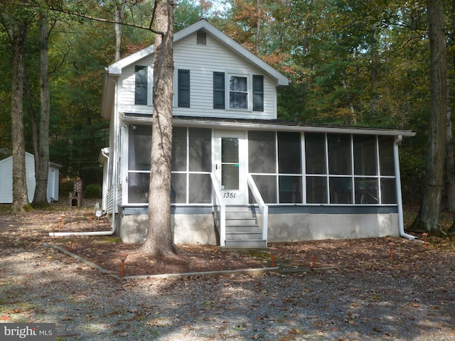 exterior space with a sunroom