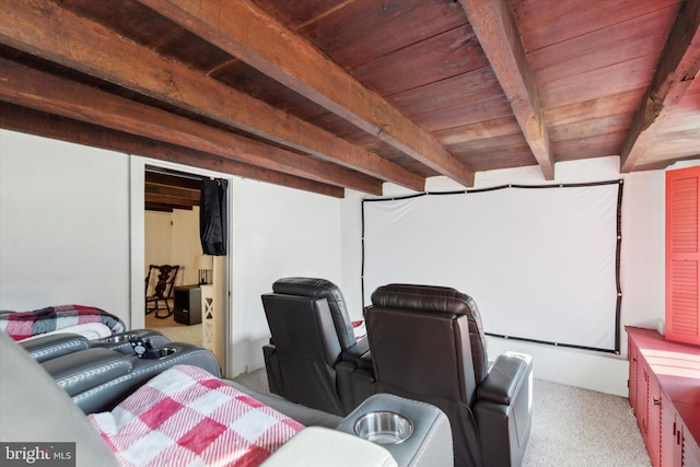 cinema with wooden ceiling, beamed ceiling, and light colored carpet