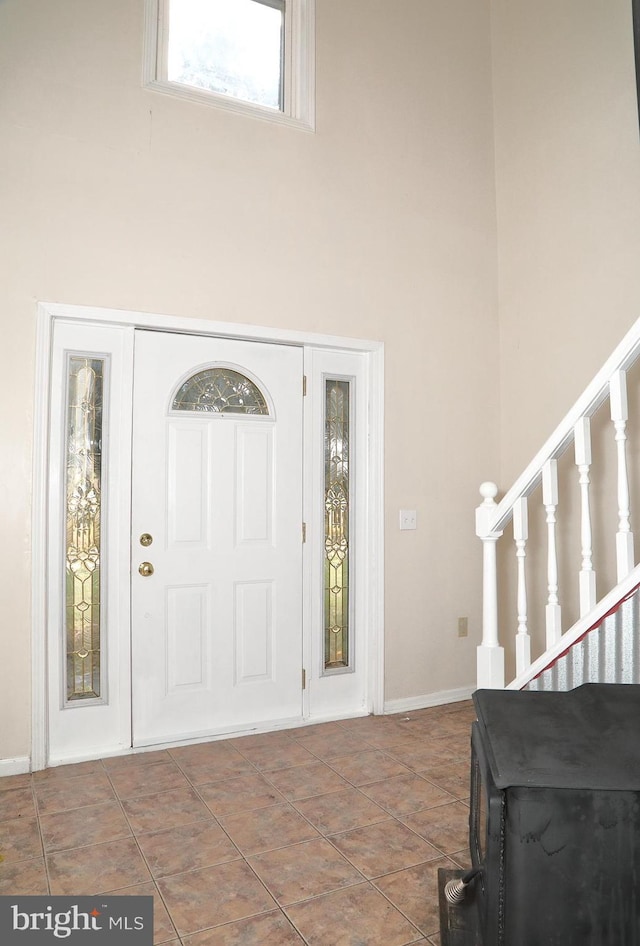 entrance foyer featuring a high ceiling