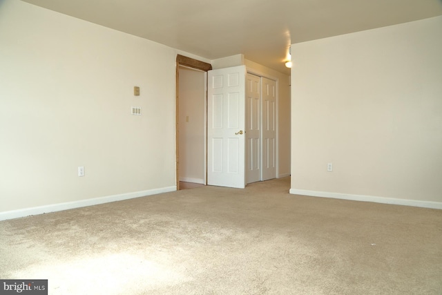 empty room featuring carpet floors