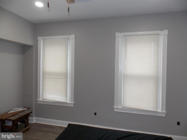 unfurnished room featuring hardwood / wood-style flooring