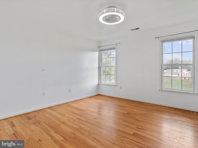 empty room with light wood-type flooring