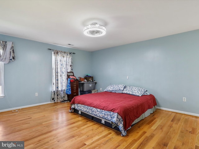 bedroom featuring light hardwood / wood-style floors